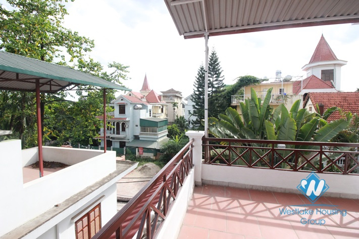 Lakeside house with small yard and nice terrace for rent in Tay Ho